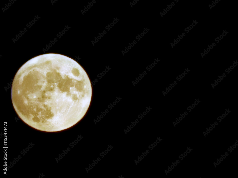 Obraz premium Attractive full moon at night. Thanks to a supermoon we could photograph a so big moon with a smartphone.