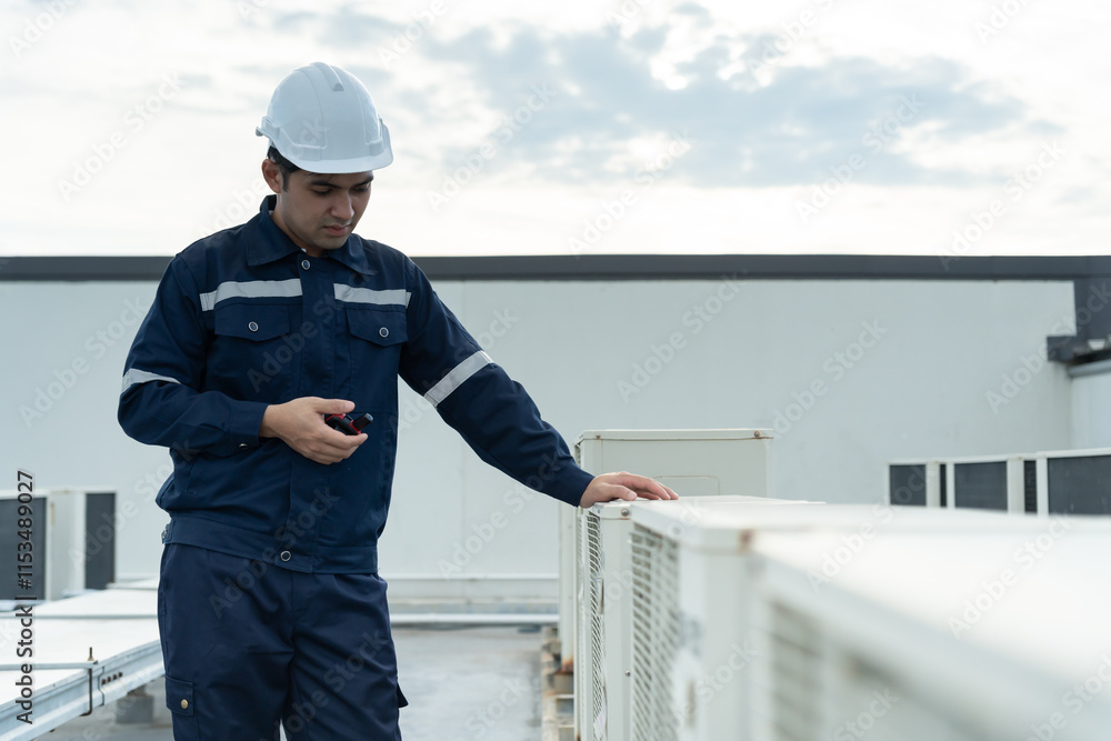 Asian maintenance engineer work on the roof of factory. contractor inspect compressor system and plans installation of air condition systems in construction. technology, walky talky, maintenance Asian maintenance engineer work on the roof of factory. contractor inspect compressor system and plans installation of air condition systems in construction. technology, walky talky, maintenance