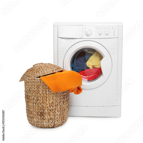 Modern washing machine and laundry basket isolated on white photo