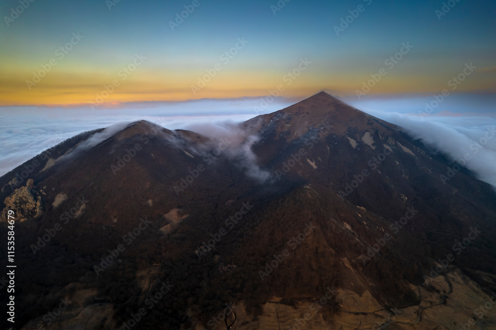Beautiful view of a mountain peak at sunset. Landscape and nature of the North Caucasus Beautiful view of a mountain peak at sunset. Landscape and nature of the North Caucasus