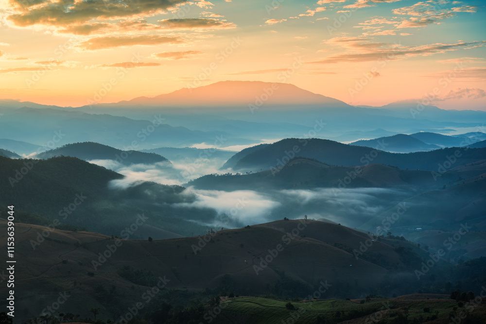 Golden sunrise shining over Doi Inthanon and foggy mountain on harvest season Golden sunrise shining over Doi Inthanon and foggy mountain on harvest season