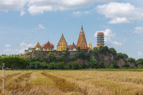 Beautiful view from outside of Wat Tham Sua, located on hill of Tha Muang District, Kanchanaburi Province, which is an ancient temple that is highly revered by the people of Kanchanaburi photo