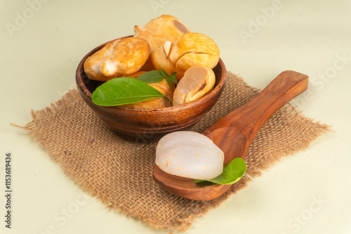 Borassus Flabellifer or Ice Apple or Wine Palm or Doub Palm - Young Fruit with Sweet and Healthy Water. In India, one of the fruits you will find on every street corner during summer. photo