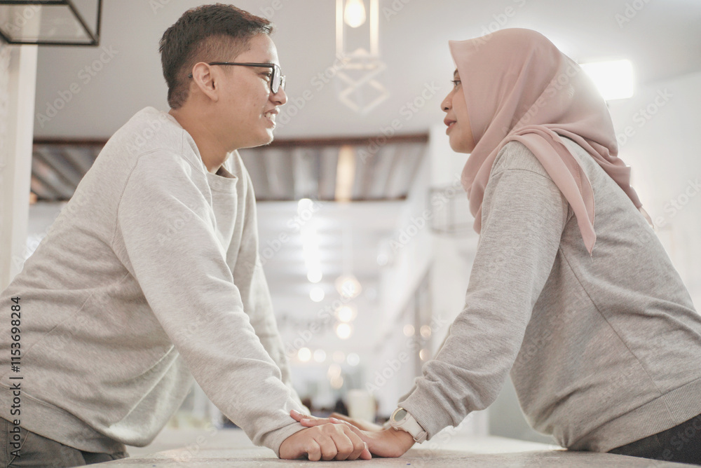 Obraz premium Muslim couple, hands together for support and empathy with care and love, solidarity and trust in relationship. Help, comfort and bonding with commitment in Islam, people in marriage with respect