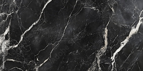 Surface texture featuring black and gray marble. It shows a rich deep black with striking white veins, ideal for use on floors and walls. Perfect for flooring and walls.