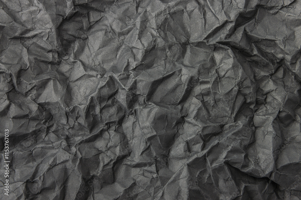 Abstract dark gray crumpled paper texture background Abstract dark gray crumpled paper texture background