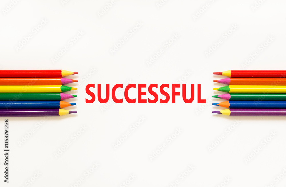 Fototapeta premium Successful symbol. Concept word Successful on beautiful white paper. Beautiful white paper background. Beautiful colored pencils. Business successful concept. Copy space.