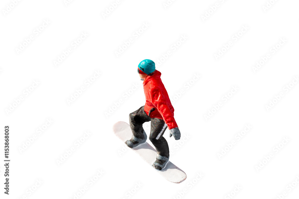 Obraz premium Miniature figurine depicting a snowboarder in mid-motion isolate on white background with clipping path