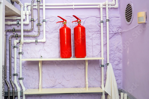 Fire extinguishers on white...