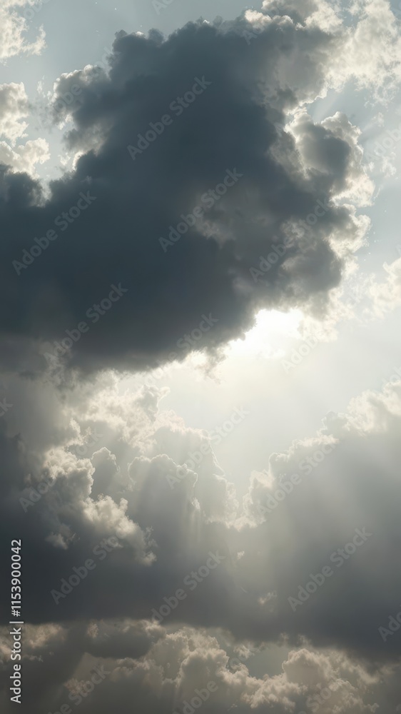 Majestic sun rays pierce dramatic, dark clouds, power,weather Majestic sun rays pierce dramatic, dark clouds, power,weather