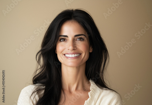 Portrait of a Smiling Woman with Long Black Hair and White Sweater