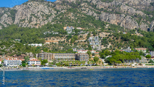 Village Turunс, neighbourhood of municipality and district Marmaris, Mugla Province, Turkey. Holiday resort on Mediterranean Sea coast. Taurus Mountains photo