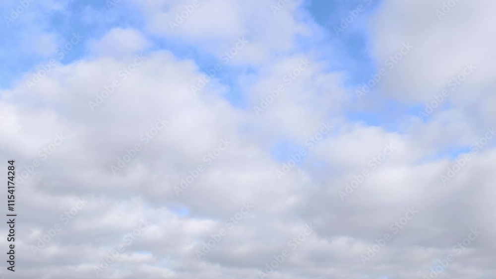 Giant cloud balls moving across the sky in the morning Giant cloud balls moving across the sky in the morning