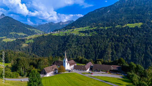 St. Gerold with the village of Raggal in the background, Gross Walsertal Valley, State of Vorarlberg, Austria photo