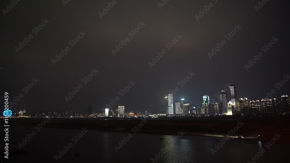 Nanchang Bayi Bridge and Tengwangge Illuminated by Night over Honggu Beach Nanchang Bayi Bridge and Tengwangge Illuminated by Night over Honggu Beach
