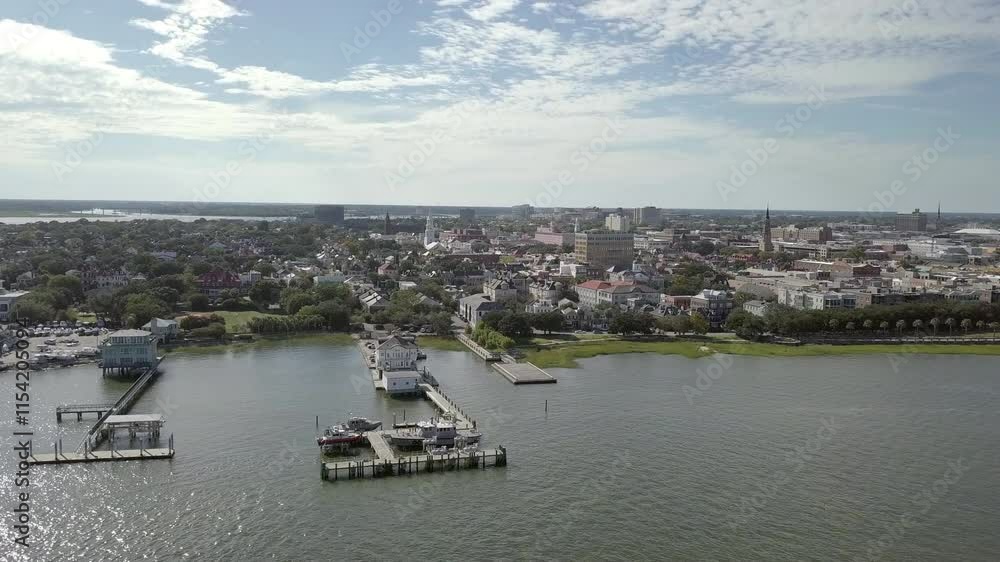 Aerial flyover of the downtown area of Charleston, South Carolina on a cloudy evening. Aerial flyover of the downtown area of Charleston, South Carolina on a cloudy evening.
