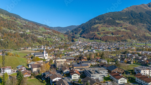 The village of Tschagguns in the Montafon Valley with Schruns in the background, State of Vorarlberg, Austria, Drone Photography photo