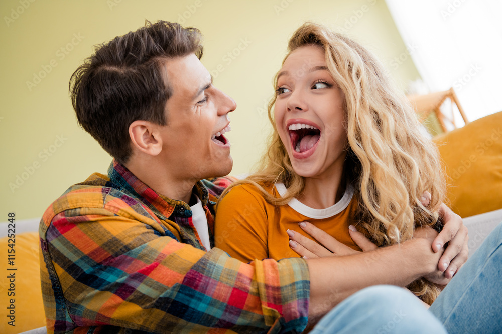 Photo of nice young couple hugging self laughing enjoy modern bright spring cozy interior flat indoors Photo of nice young couple hugging self laughing enjoy modern bright spring cozy interior flat indoors