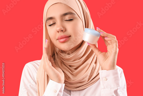 Young Muslim woman in hijab...