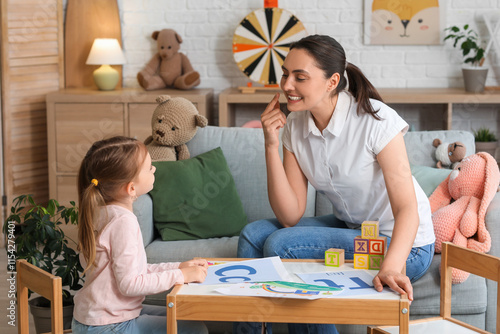 Female speech therapist wit...