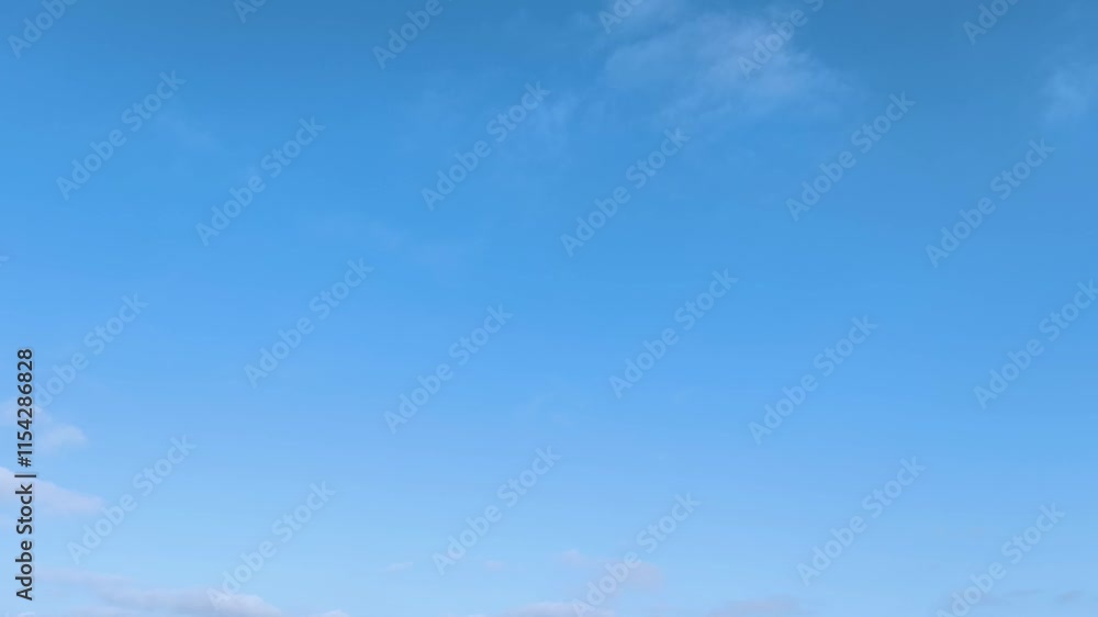 Elongated clouds moving across the sky Elongated clouds moving across the sky