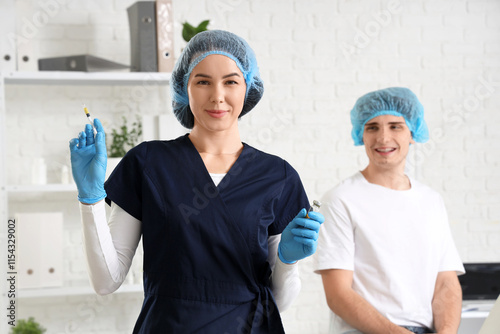 Female plastic surgeon with...