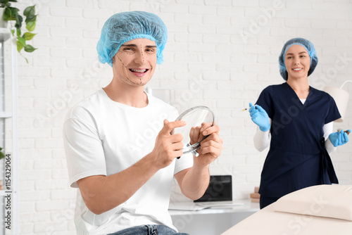 Young man with marked face ...