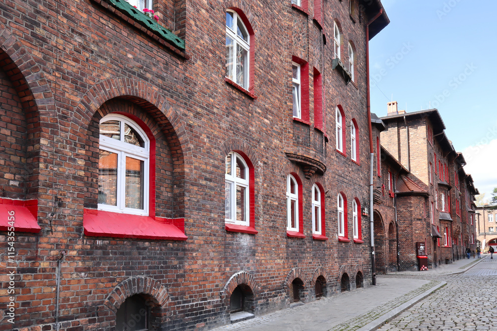 Red brick old building in Nikiszowiec historic mining district of Katowice, Poland