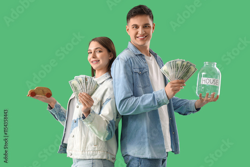 Young couple with money for...