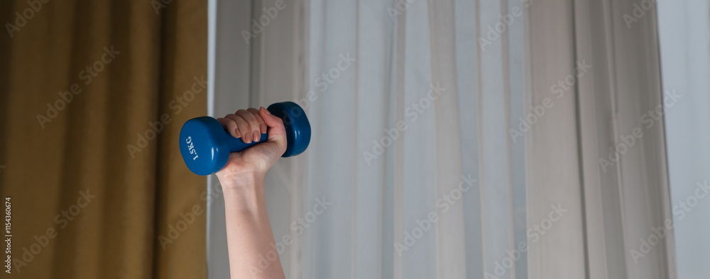 woman in with a dumbbell woman in with a dumbbell