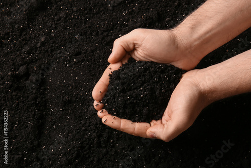 Female hands with black soi...