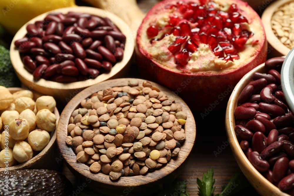 Different superfood products on wooden table, closeup Different superfood products on wooden table, closeup