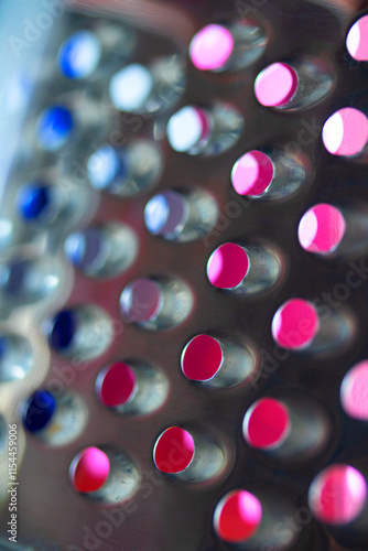 Close Up of a Steel Metal Perferated Hole Background Abstract Futeristic Circles photo