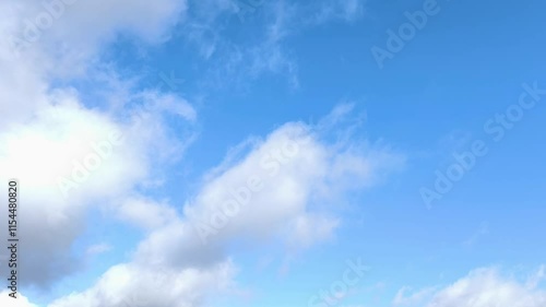 Beautiful landscape of clear blue sky with white clouds circulating