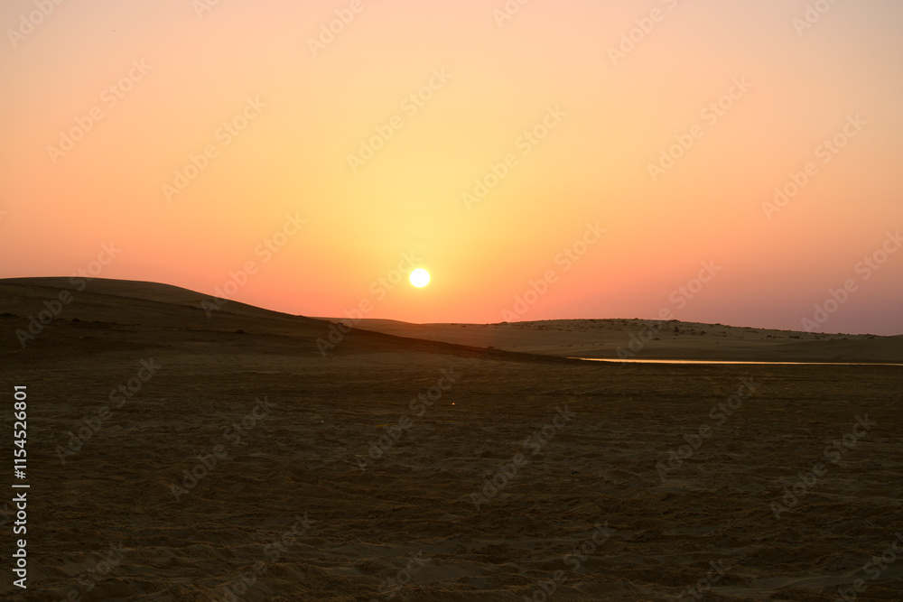 sunset view in the desert at doha, qatar sunset view in the desert at doha, qatar