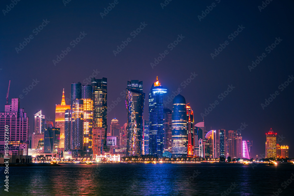 seaside view of tall skyscrapers in the corniche area of doha city qatar seaside view of tall skyscrapers in the corniche area of doha city qatar