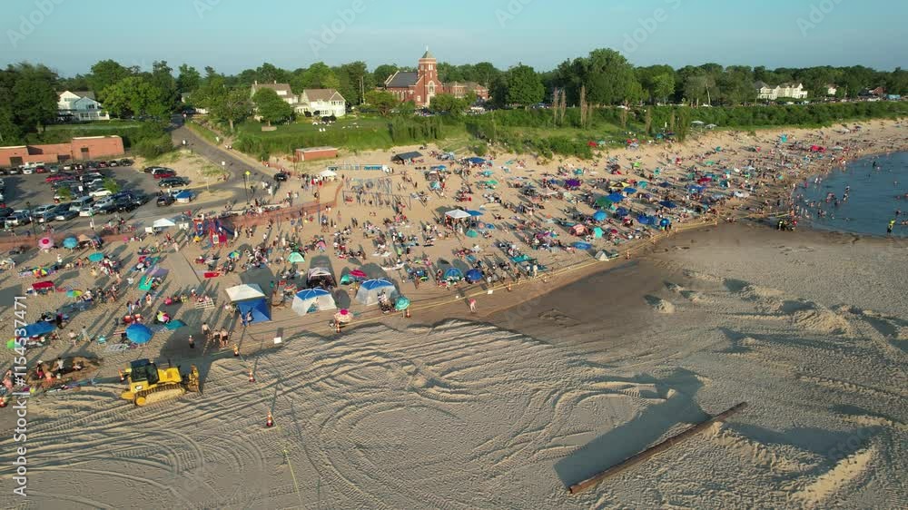 Aerial view of the beach filled with people on a hot sunny day in Lake Michigan South Heaven Michigan Aerial view of the beach filled with people on a hot sunny day in Lake Michigan South Heaven Michigan
