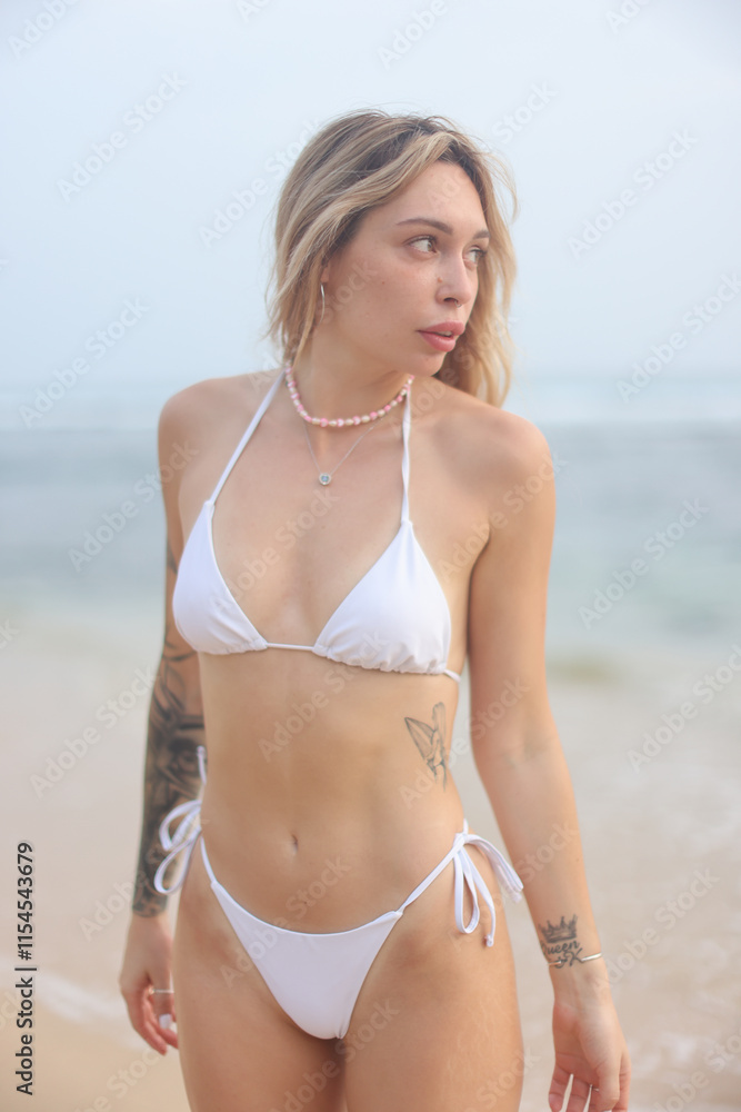 Beach Vibes A Young Woman in Trendy and Stylish Swimwear Enjoying the Sunny Day Beach Vibes A Young Woman in Trendy and Stylish Swimwear Enjoying the Sunny Day