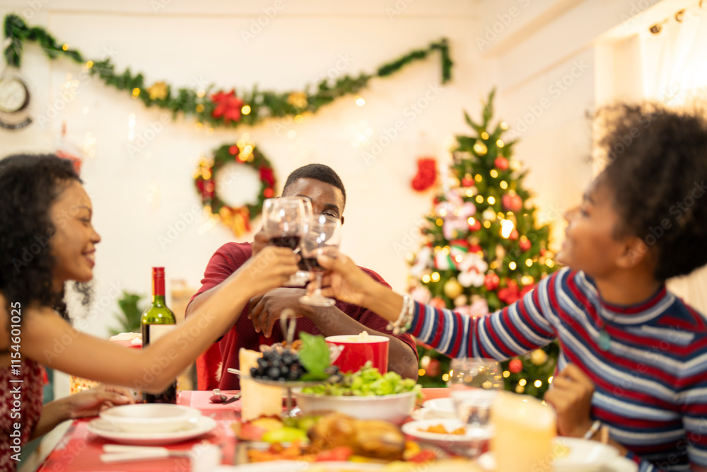 A family enjoys a festive Christmas dinner, sharing food and creating memories. A beautifully decorated Christmas tree and wreath add warmth, while candles and decor enhance the cozy holiday setting. A family enjoys a festive Christmas dinner, sharing food and creating memories. A beautifully decorated Christmas tree and wreath add warmth, while candles and decor enhance the cozy holiday setting.