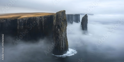 Dramatic Coastal Cliffs Enveloped in Mist A Stunning Aerial Photograph photo