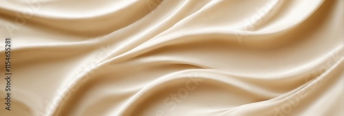 Smooth Flowing Light Beige Fabric with Elegant Folds in TopDown View photo