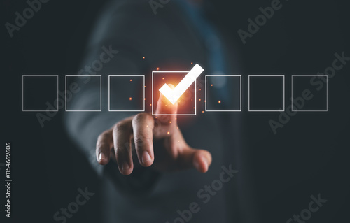 Businessman hand touching to tick correct sign mark on checkbox from checklist , Business selection choice concept.