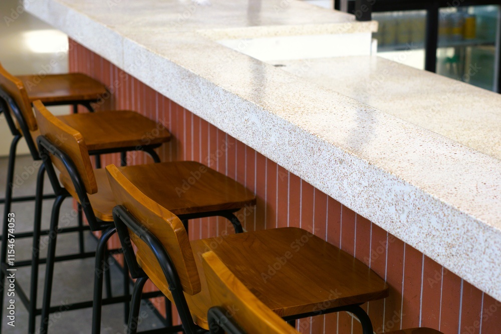 interior of a cafe with wooden chair stool interior of a cafe with wooden chair stool