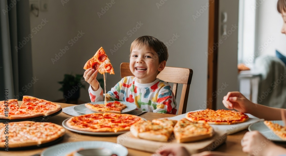 Happy child eating pizza at table with multiple pizzas Happy child eating pizza at table with multiple pizzas
