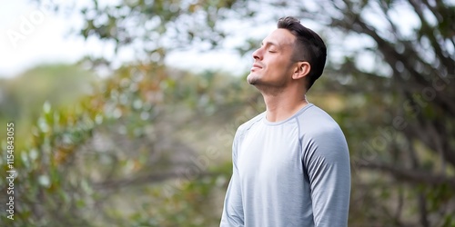 Relaxed Man Breathing Outdoors in Green Nature Wearing Casual Comfortable Clothing