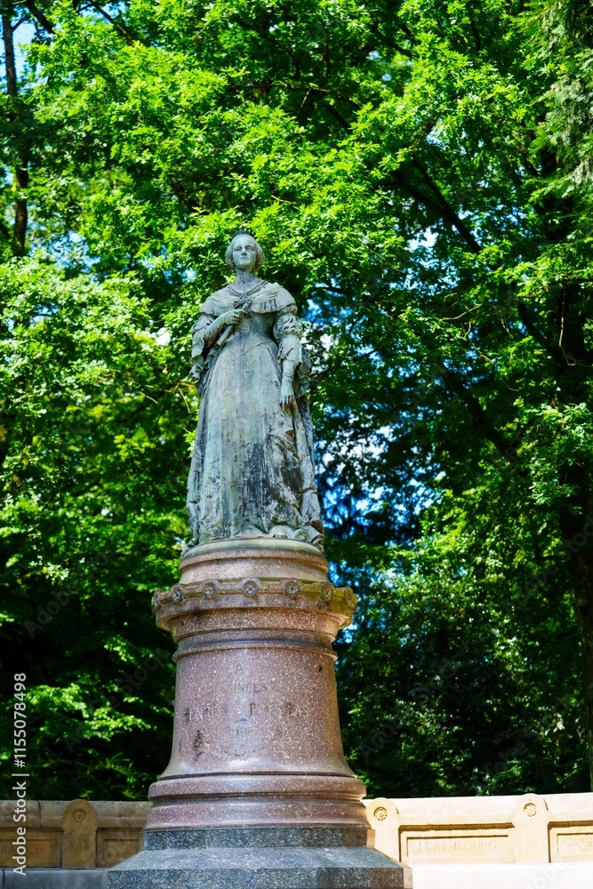 A bronze statue of Grand Duchess Charlotte stands in a park in Luxembourg City. The statue was created by Luxembourgish sculptor Auguste and was inaugurated in 1930. A bronze statue of Grand Duchess Charlotte stands in a park in Luxembourg City. The statue was created by Luxembourgish sculptor Auguste and was inaugurated in 1930.