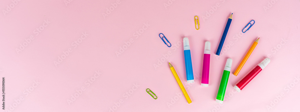A banner with stationery and creative goods on a pink background. Colorful markers and pencils in concept for school supplies, shops and online stores, sales, hand-made and creativity. Copy space text A banner with stationery and creative goods on a pink background. Colorful markers and pencils in concept for school supplies, shops and online stores, sales, hand-made and creativity. Copy space text