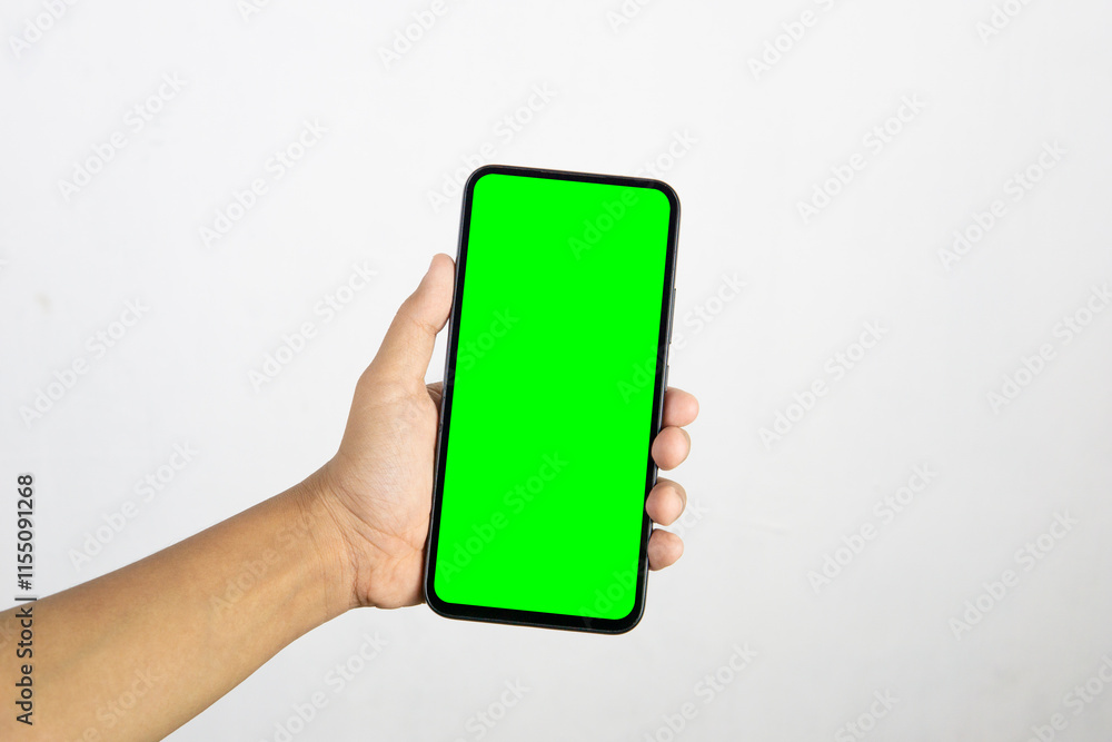 Hand holding smartphone with blank screen isolated on white background Hand holding smartphone with blank screen isolated on white background