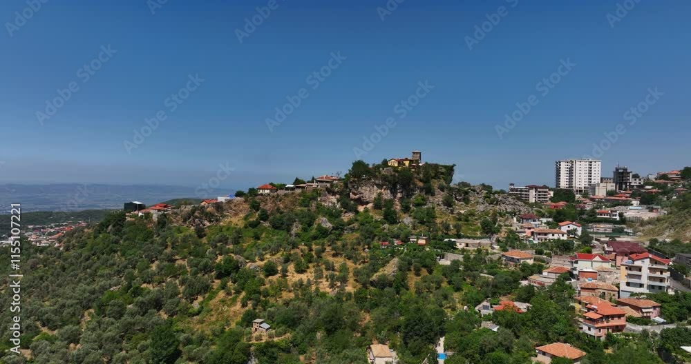 Aerial view approaching the Castle of Kruja, sunny, summer day in Krujë, Albania Aerial view approaching the Castle of Kruja, sunny, summer day in Krujë, Albania