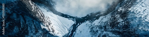 Aerial panorama of the fjordlands around Trolltunga covered in snow. with intricate shadows creating a dramatic effect. in 4K resolution photo